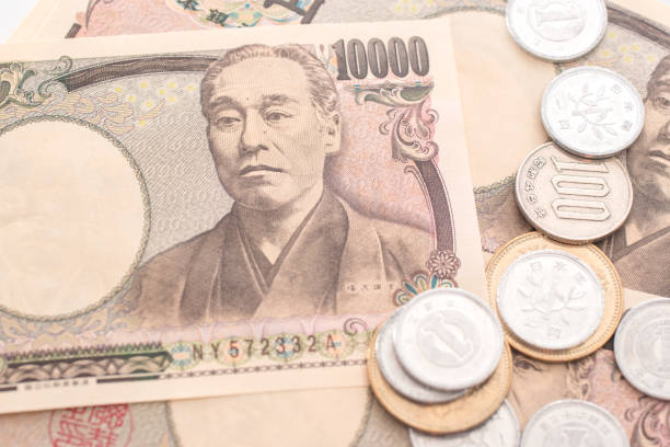 iene japonês notas e moedas de yen japonês - beak buying currency exchanging - fotografias e filmes do acervo