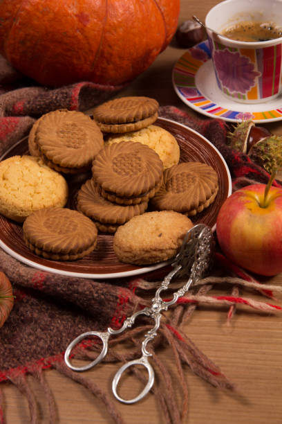 istock Autumn concept with pumpkin and a cup of coffee 1048361802