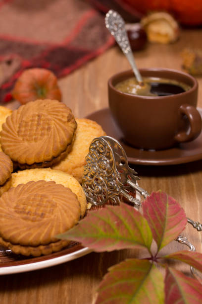 istock Autumn concept with a cup of hot coffee 1048361820