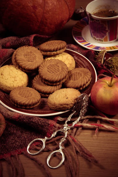 istock Autumn concept with pumpkin and a cup of coffee 1048362014
