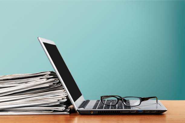 Laptop. Laptop and black glasses  on   background. editorial stock pictures, royalty-free photos & images