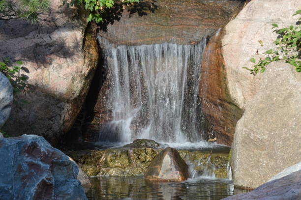 istock Waterfall in the Japanese garden 1048379960