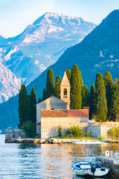 Perast, Bay of Kotor, Montenegro Bay of Kotor, Montenegro, with its amazing churches on two islands. Perast is situated a few kilometres northwest of Kotor and is noted for its proximity to the islets of St. George and Our Lady of the Rocks. montenegro stock pictures, royalty-free photos & images
