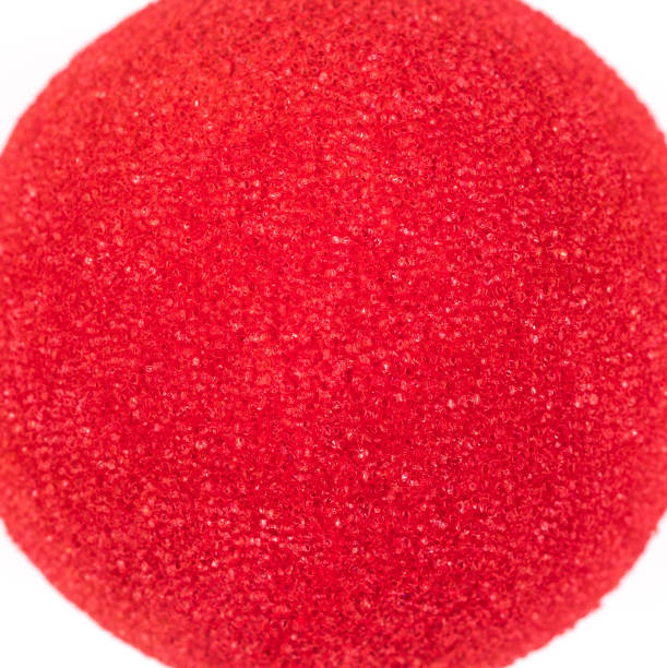 istock Red Nose Day, red nose on white background 1048386786