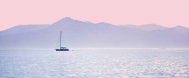 istock yacht sailing over the sea 1048387224