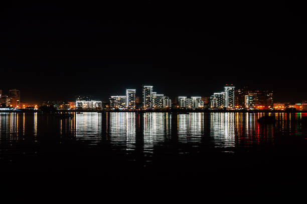istock reflection of the night quay 1048387248