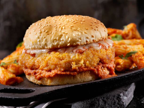 istock Chicken Parmesan Burger with a Side of Pasta 1048387680