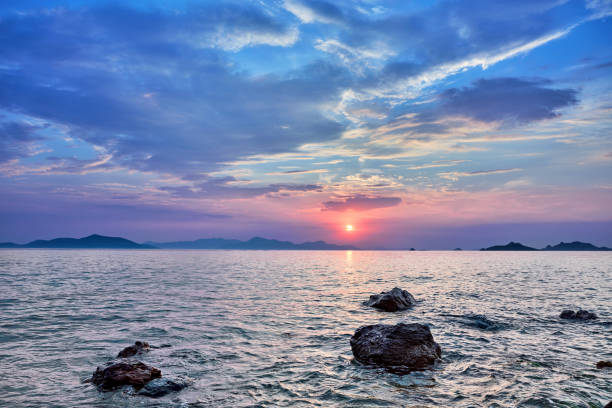 Beautiful seascape at sunset over the sea with blue and pink pastel colors at Turgutreis, Bodrum, Turkey