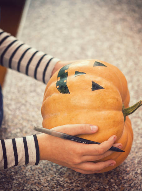 istock Family Preparing for Halloween 1048394176