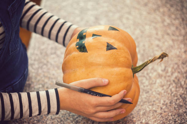 istock Family Preparing for Halloween 1048394192