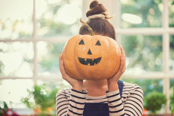 istock Family Preparing for Halloween 1048394374