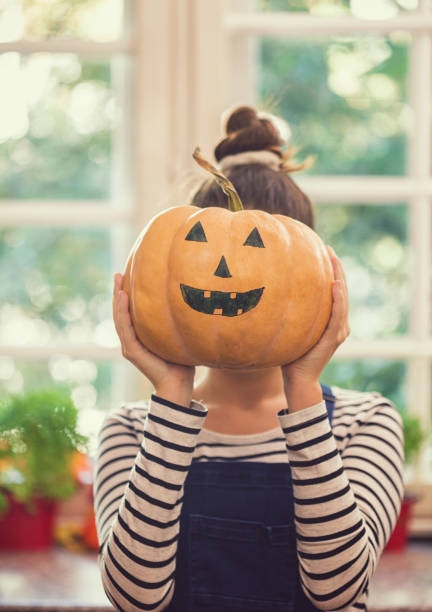 istock Family Preparing for Halloween 1048394380