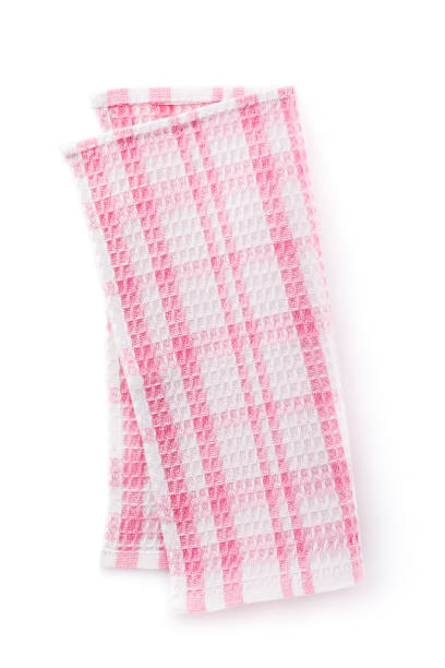 istock Pink cotton napkin folded in half, isolated on white background, top view 1048394900