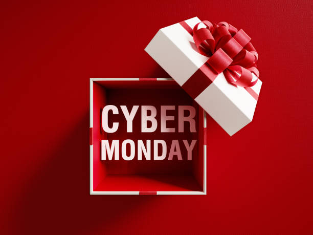 кибер понедельник текст выходит из белого подарочная коробка связана с красной лентой - cyber monday стоковые фото и изображения