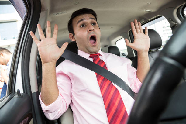istock Businessman driving a car - Stock image 1048397462