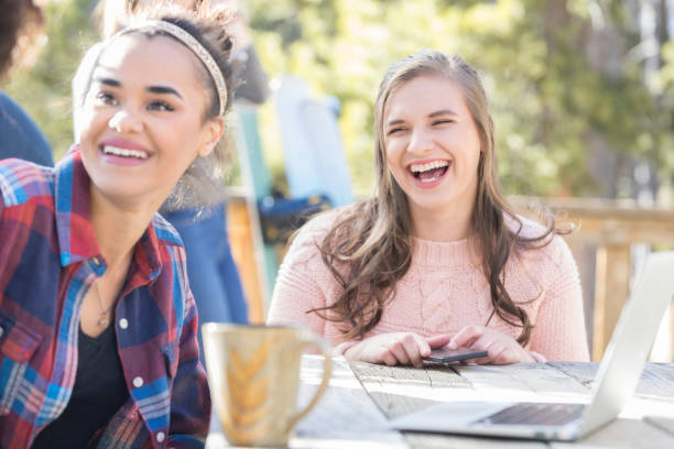 istock Women laughing together 1048402700