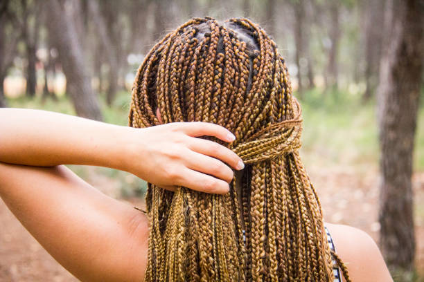 istock Young beautiful girl with braided hair 1048411708