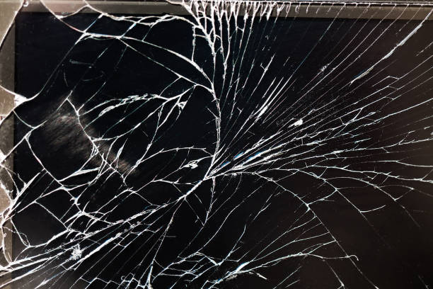 istock Old Black Cracked Touch Screen Phone, broken cellphone 1048412596