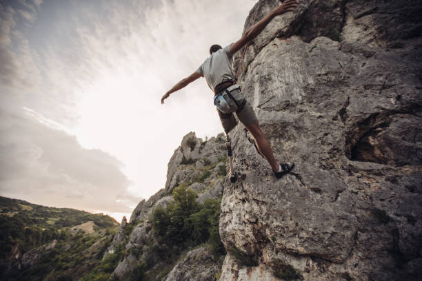 istock Disability man free rock climbing 1048426478