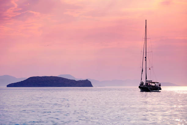 istock Yacht anchored near an island 1048431928