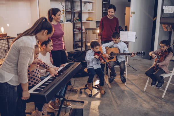 istock Kids in music school 1048432436