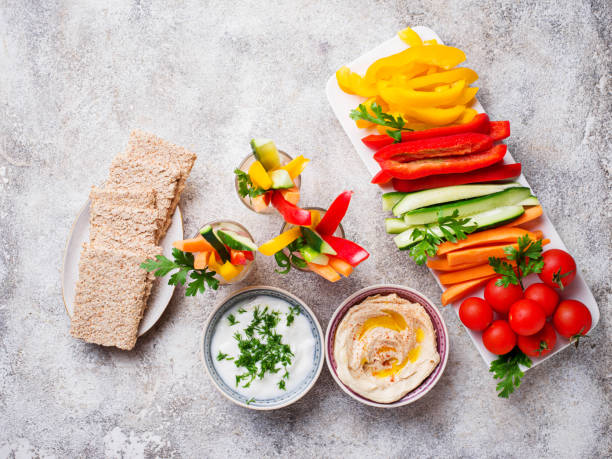 istock Healthy snacks. Vegetables and hummus 1048432514