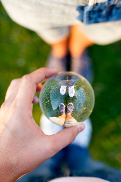 glass sphere and two feet