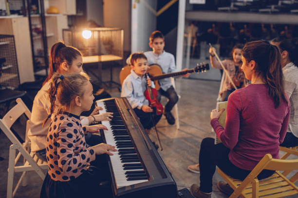 istock Playing music in a youth orchestra 1048435476