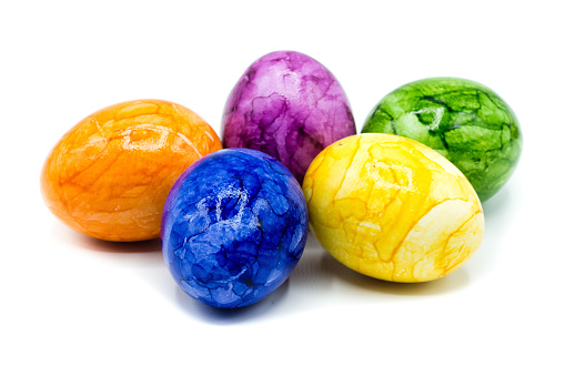 colorful painted easter eggs in a nest