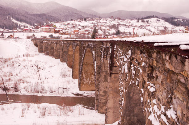 istock Old railway bridge. Old arch bridge. Winter. 1048441032