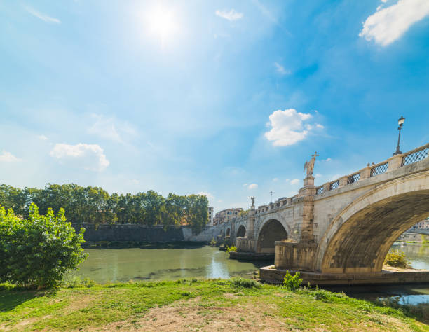 istock Sant Angelo bridge under a blue sky with clouds in Rome 1048450274