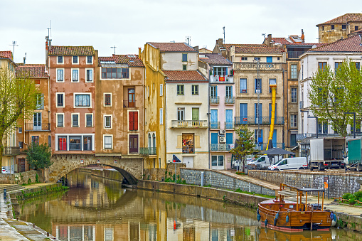 Narbonne, France - houses and water canal
