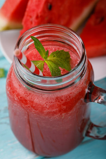 istock Freshly made smoothies from watermelon, closeup 1048460462