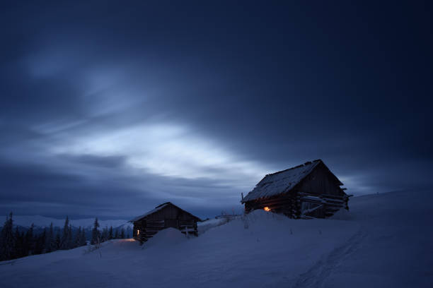 Abandoned barn in frosty landscape
