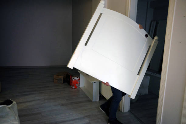 istock Moving home unplaced furniture 1048474694