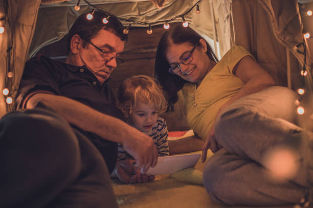 istock Playful night with grandparents 1048477474