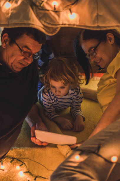 istock Playful night with grandparents 1048478004