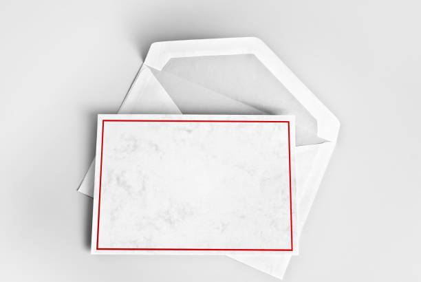 istock Blank greeting or thank you card with red frame over envelope 1048485748