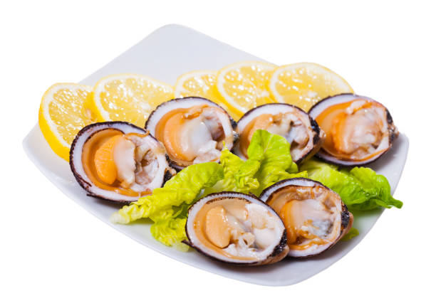 istock Fresh bivalve mussels with lemon 1048491160