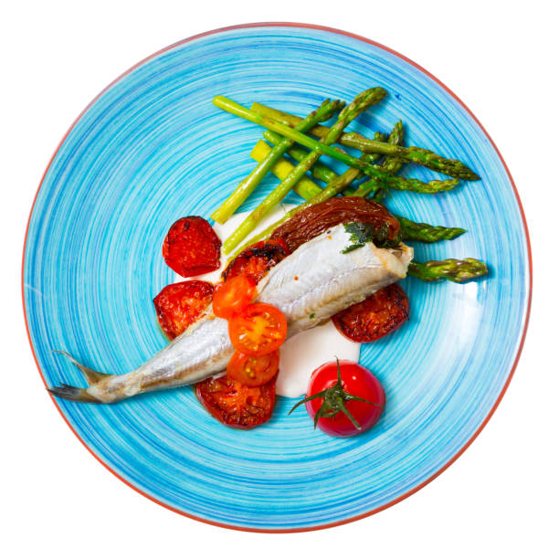 istock Top view of baked whiting with vegetables 1048491440