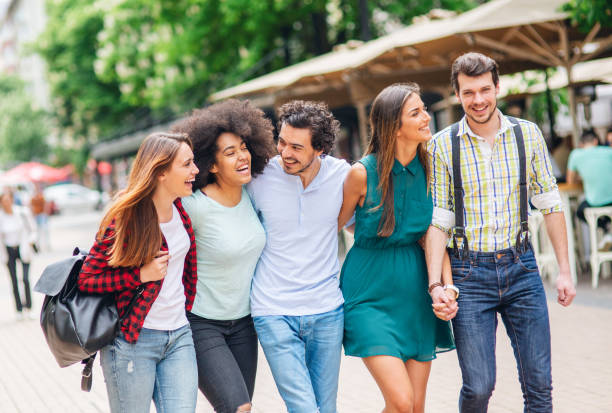 istock Happy friends on the street 1048500540