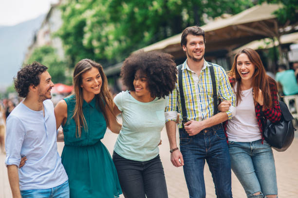 istock Happy friends on the street 1048500542