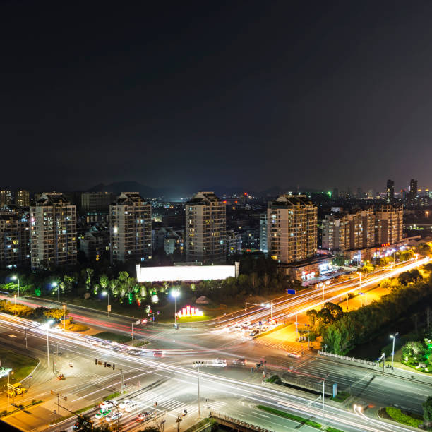 istock the light trails on the modern building background 1048507012