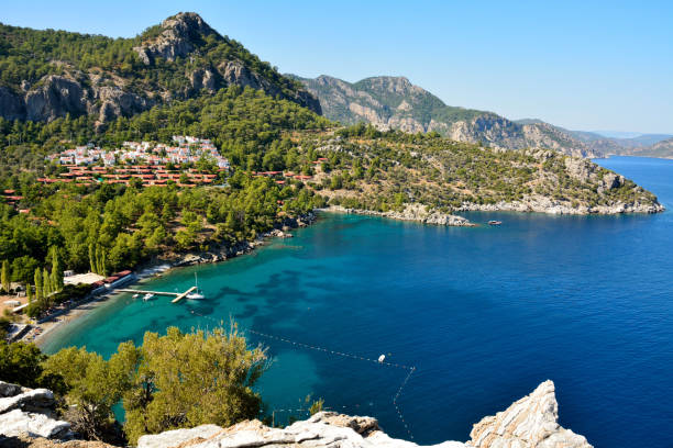 Medterranean coastline and cottage village near Turunc suburb of Marmaris resort town in Turkey. Medterranean coastline and cottage village near Turunc suburb of Marmaris resort town in Turkey. marmaris stock pictures, royalty-free photos & images