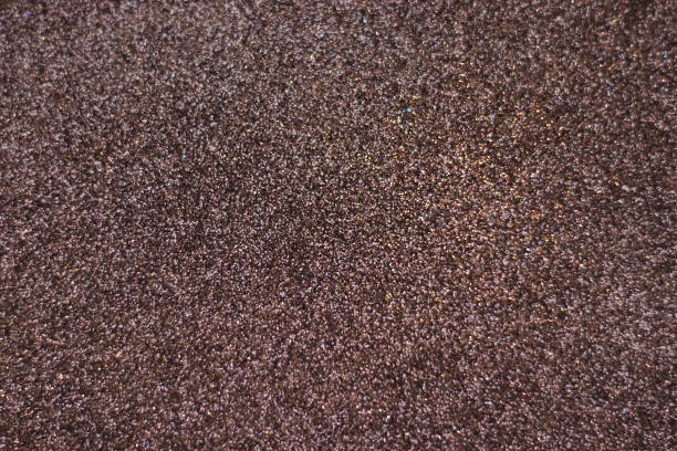 istock brown golden glitter texture christmas abstract background 1048509700