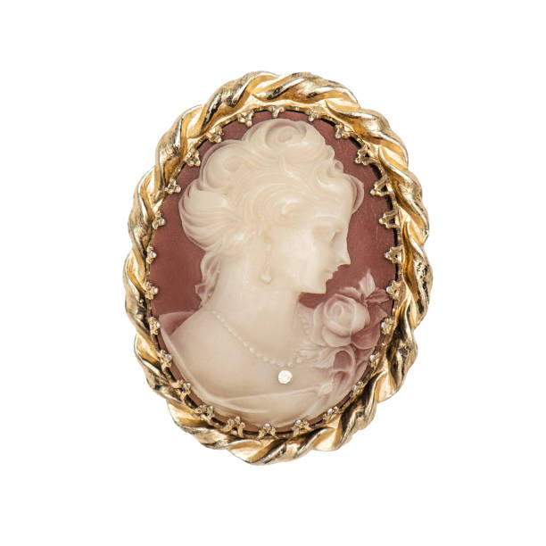 istock Vintage brooch woman face white background 1048510102