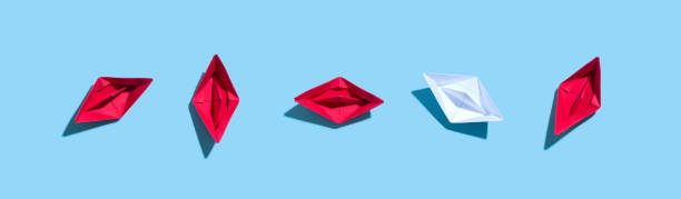 istock One out unique paper origami boat 1048519976