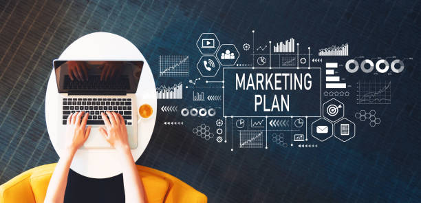 istock Marketing Plan with person using a laptop 1048520112