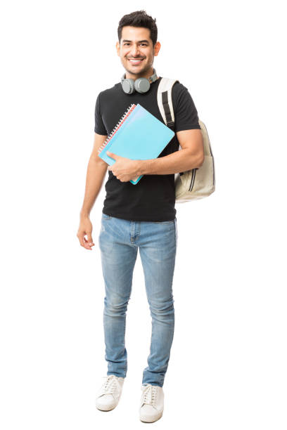 handsome guy with backpack and university books - adult education full length book imagens e fotografias de stock