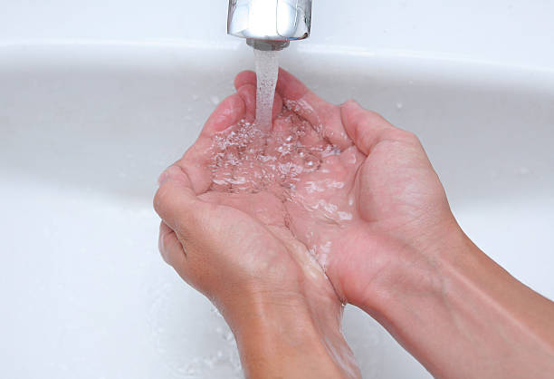 istock male hands washing with water 104853837